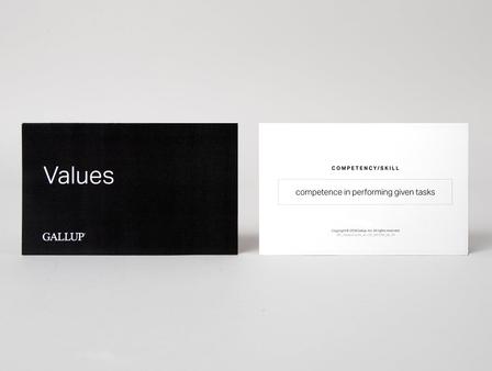 Two cards, side by side, one displaying the front of a card and the other displaying the back.