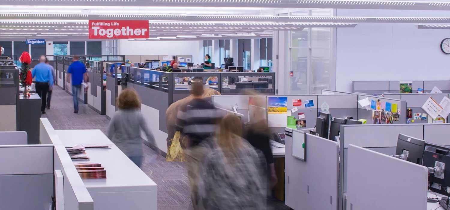 Image of employees in office space.