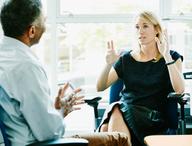 People in a coaching session.