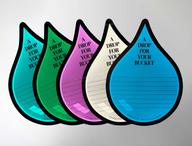 Five drops in the cool color palette: teal, green, purple, cream and blue.